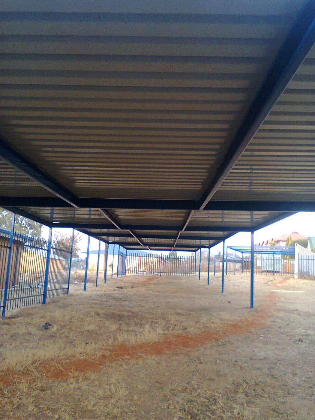 Underside of the carport roof showing the steel frame and roof sheeting